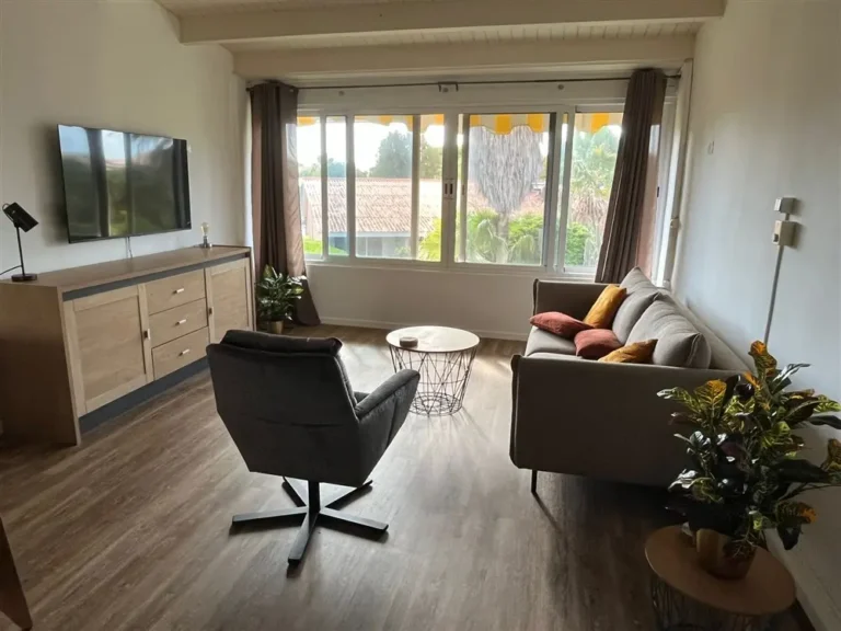 Seru coral vakantiexx appartement casa fortuna luie stoel zitruimte met uitzicht